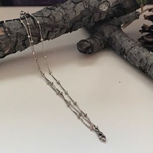 Sterling silver triple strand bracelet